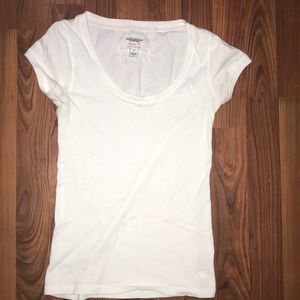 White scoop neck shirt